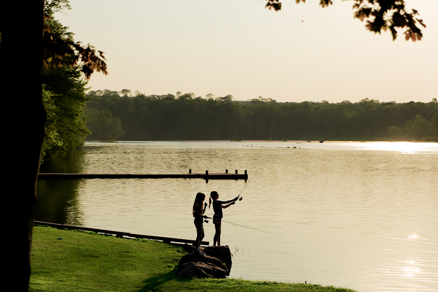 Girls fishing in the lake